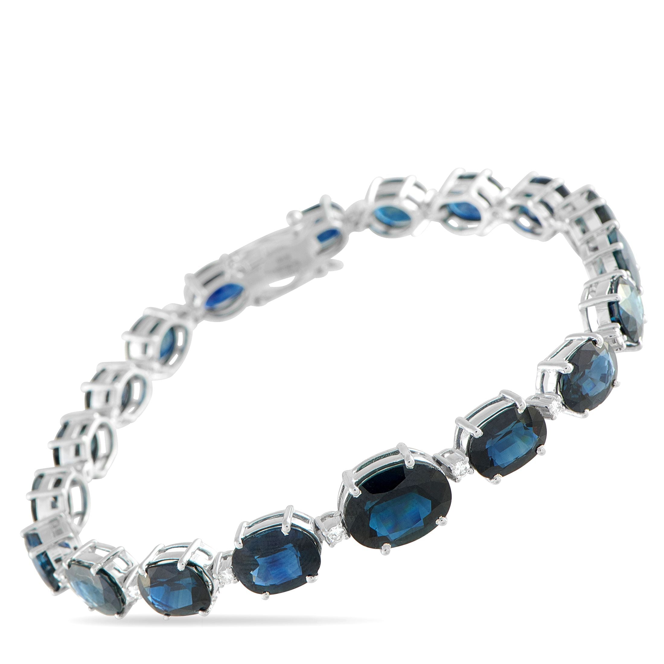 Exclusive White Gold 0.32ct Diamond and Sapphire Bracelet #5203 – Elegant in proportion and fluid in form, this Exclusive  br