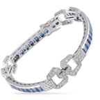 Art Deco white gold bracelet with blue sapphire channel and square diamond accents