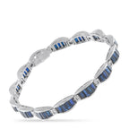 White gold bracelet with blue sapphire baguette links and small diamond accents