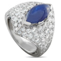 White gold diamond ring with oval blue sapphire center in bezel setting