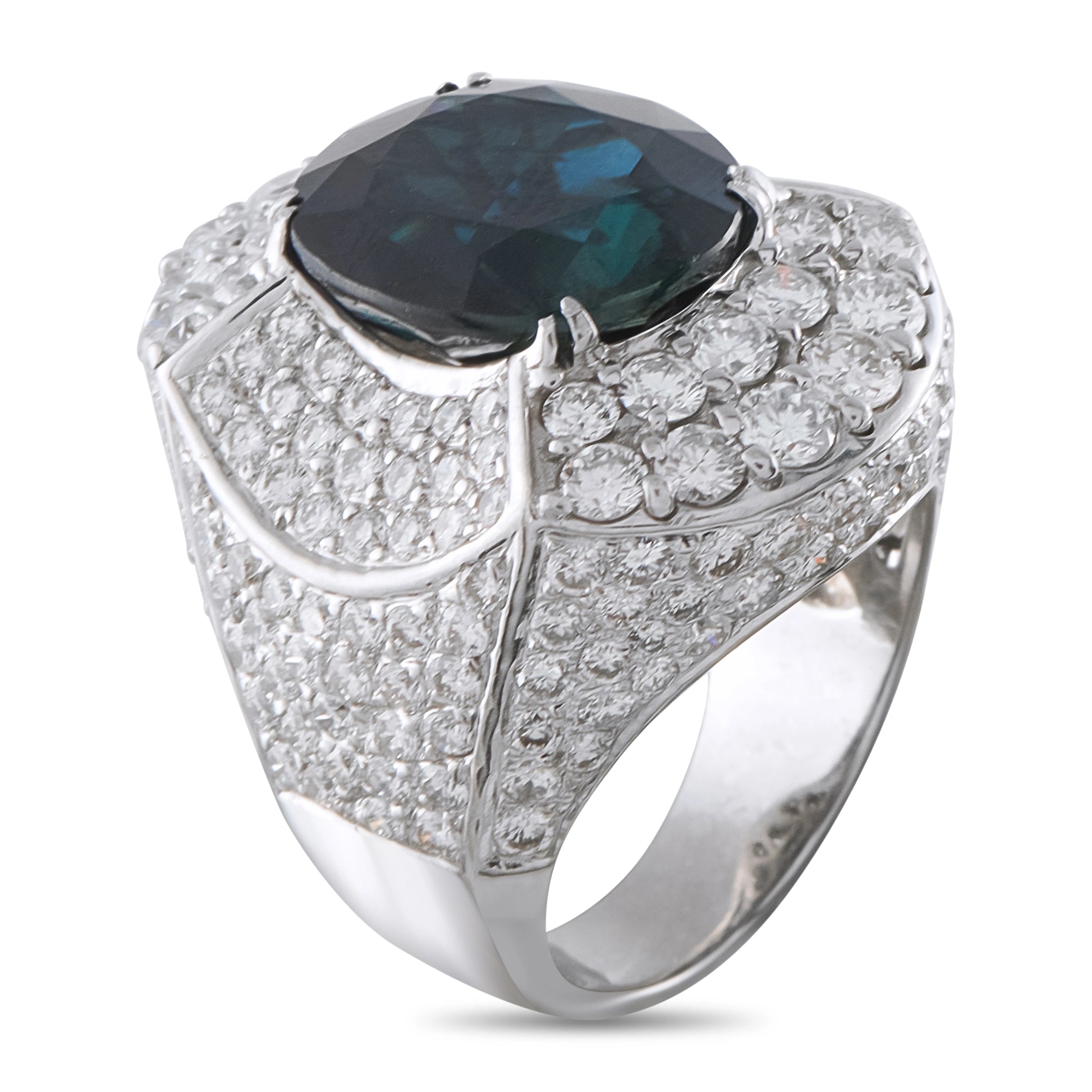 White gold ring featuring a dark oval center stone with sparkling diamond accents