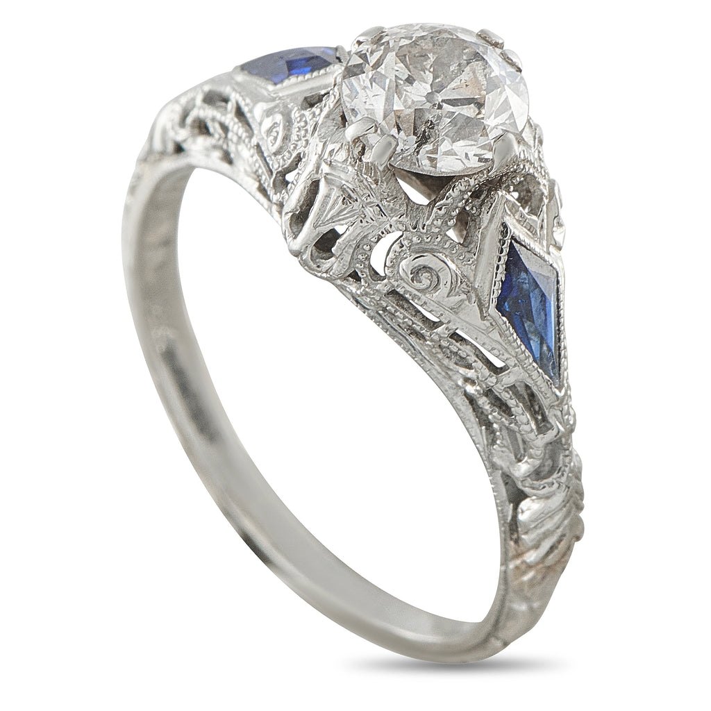 Art Deco 18K white gold ring with clear diamond and blue sapphire accents