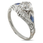 Art Deco 18K white gold ring with clear diamond and blue sapphire accents