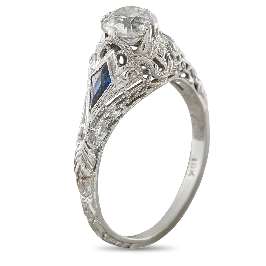 Art Deco 18K white gold ring with clear center stone and blue side accents