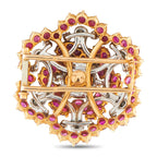 Gold and silver-toned brooch with purple ruby-style stones and openwork back frame