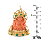 Happy Buddha pendant, coral-colored carved figure in 18K yellow gold with green emerald stones