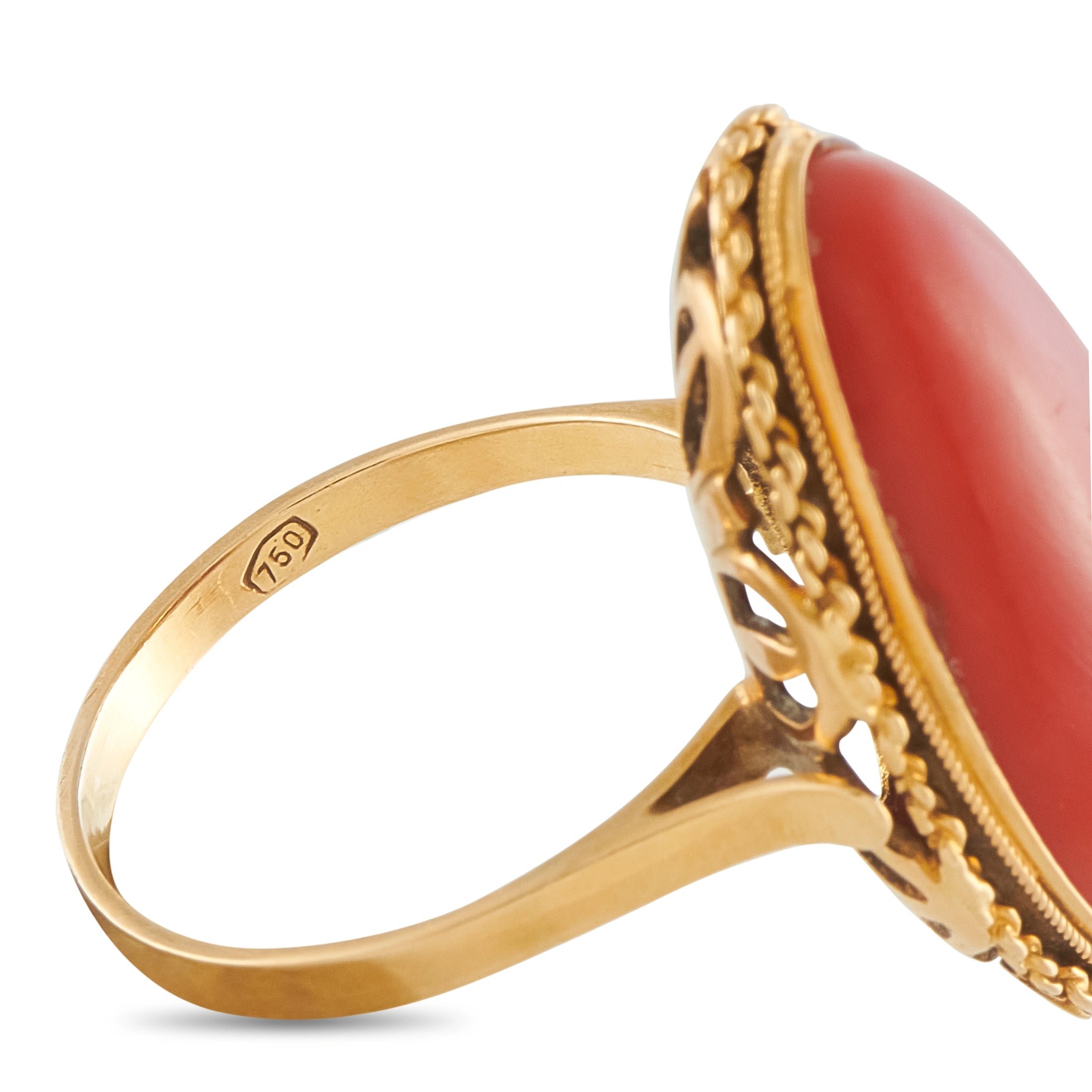 18K yellow gold ring band with side view of oval coral-red stone bezel