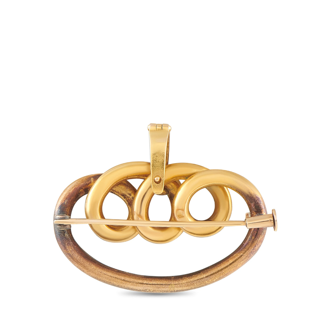 Yellow gold oval brooch pin with openwork scroll loops and diamond border