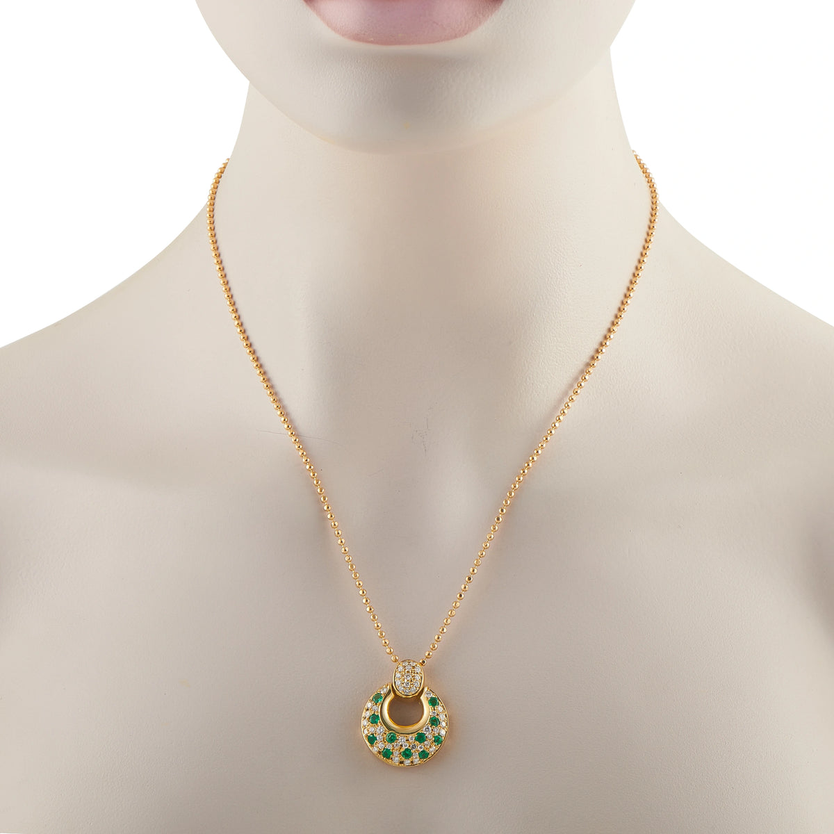 18K yellow gold necklace with small circular emerald and diamond pendant