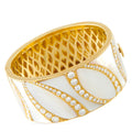 Yellow gold bracelet with pearly inlays and diamond accents, openwork center