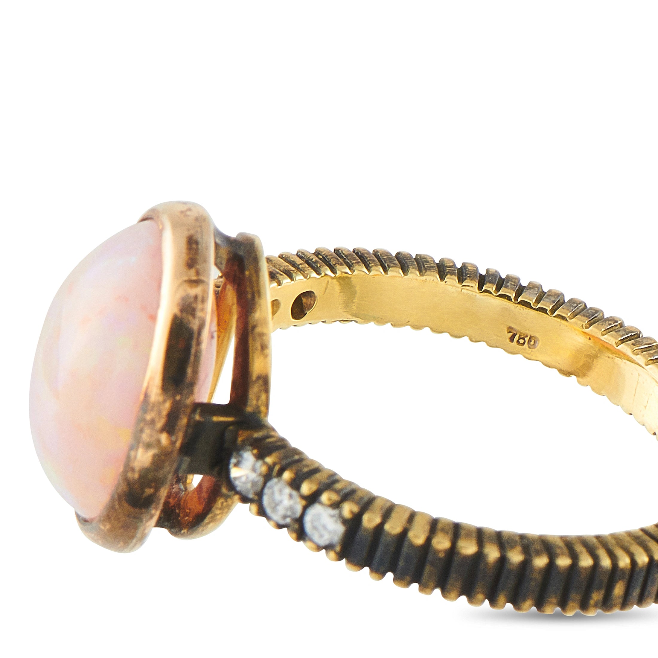 18k yellow gold oval opal ring side view with ribbed band and diamond detail