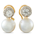 Yellow gold earrings with round pearl drops and diamond halo settings