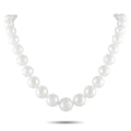 White pearl bead necklace with evenly spaced round pearls on a simple strand