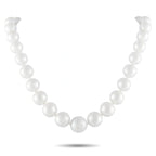 White pearl bead necklace with evenly spaced round pearls on a simple strand