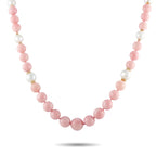 Pink and white bead necklace with round pink opal-style stones and gold accents