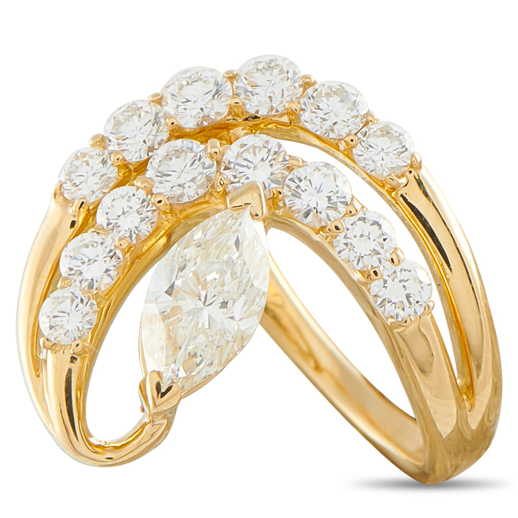 Yellow gold diamond cluster ring with oval center and round stones