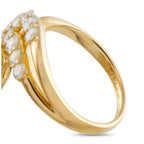 Close-up of yellow gold diamond ring band with round stones and inner engraving