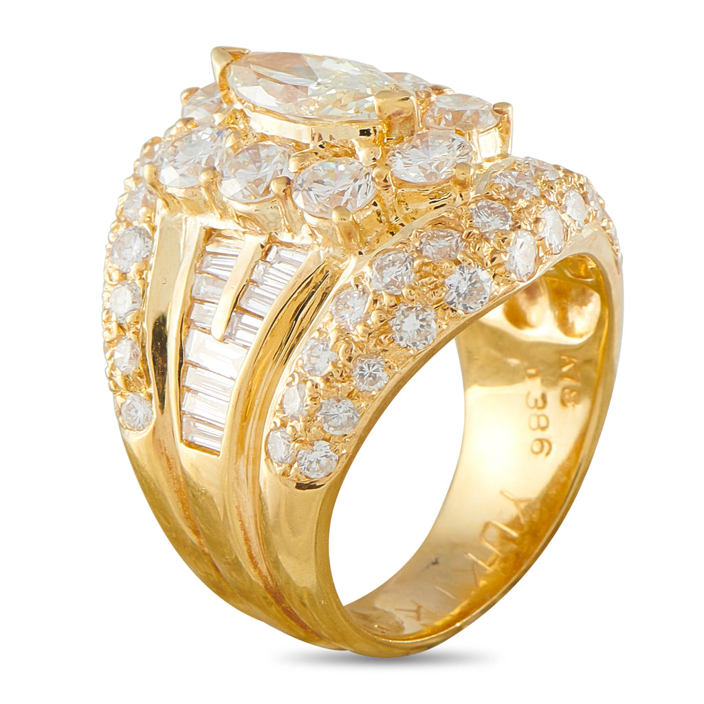 18K yellow gold diamond ring with side marquise setting and diamond band