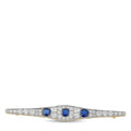 18K yellow gold brooch with diamonds and three blue sapphires