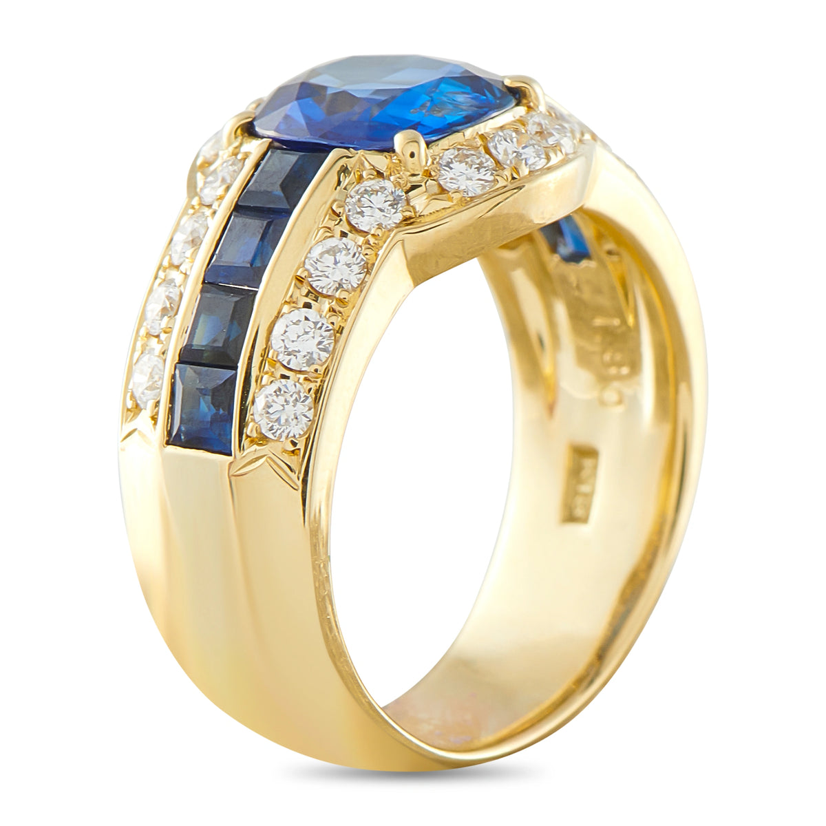 18K gold ring side view with large blue sapphire and round diamond accents