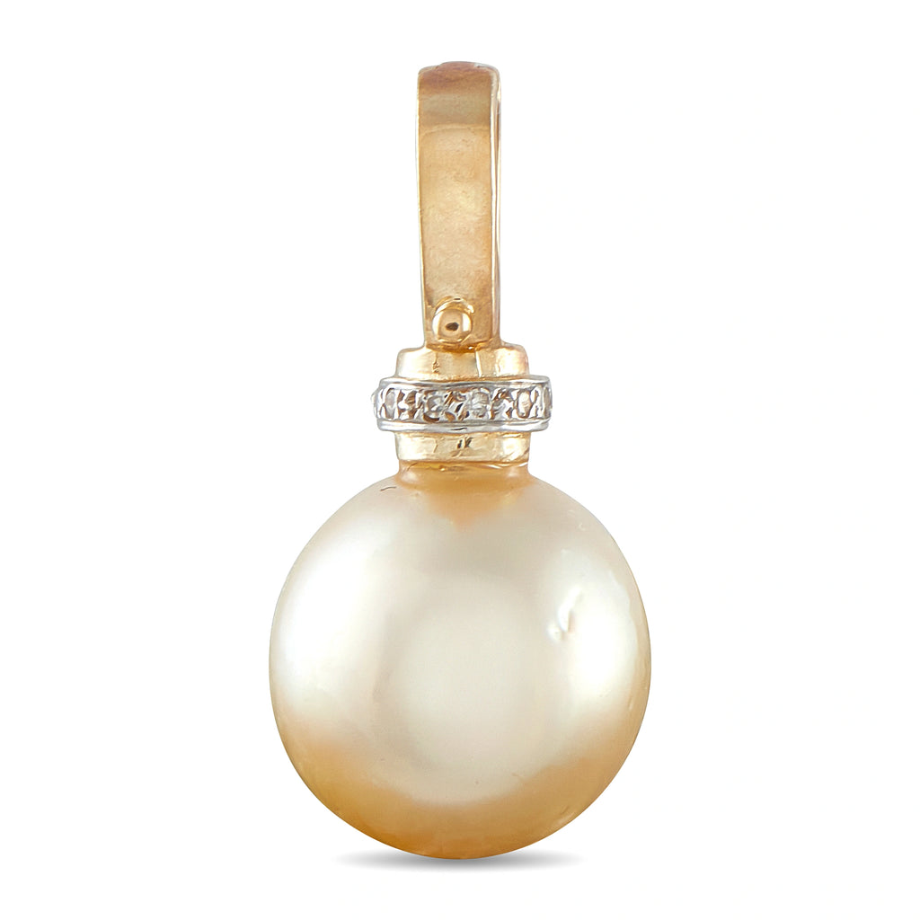 Yellow gold pearl pendant with diamond ring around bail, side view