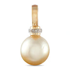 Yellow gold pearl pendant with diamond ring around bail, side view