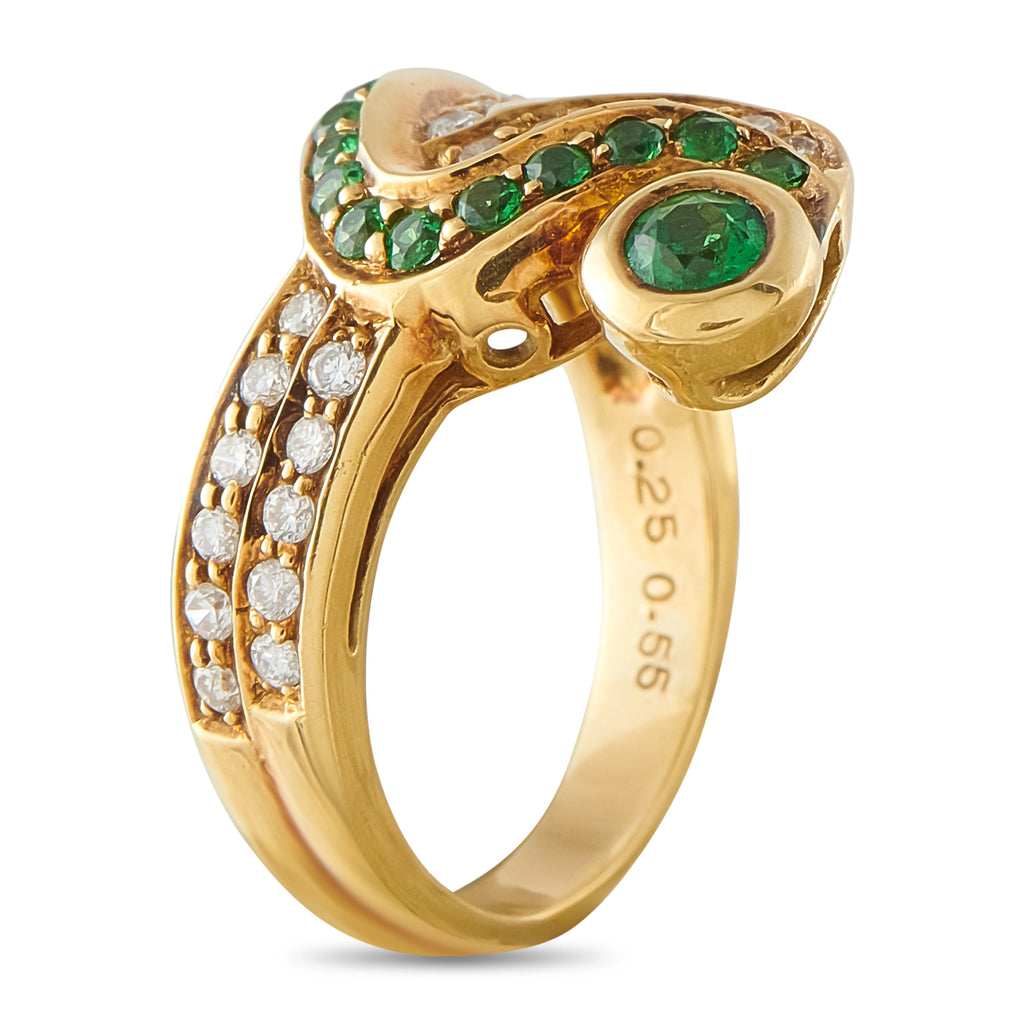 18k yellow gold ring with clustered green stones, large oval center, and diamonds
