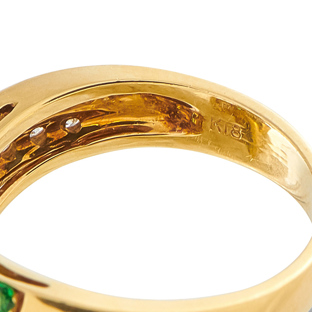 18k yellow gold ring interior with stamped hallmark and smooth band