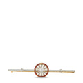 Antique gold and platinum brooch with red enamel circular center and diamond accents