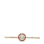Antique gold and platinum brooch with red enamel circular center and diamond accents
