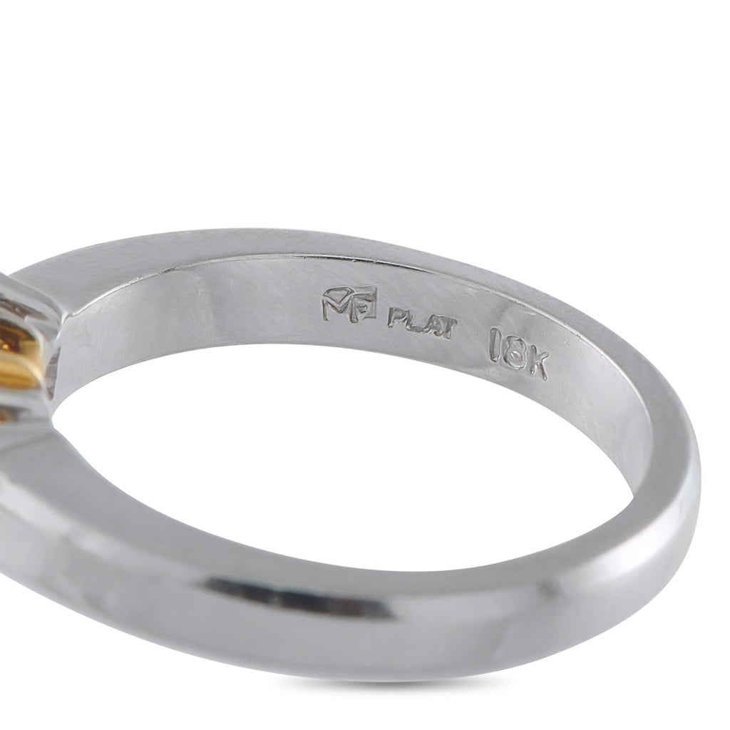 Platinum and 18K Yellow Gold 0.82ct Diamond Three-Stone Ring