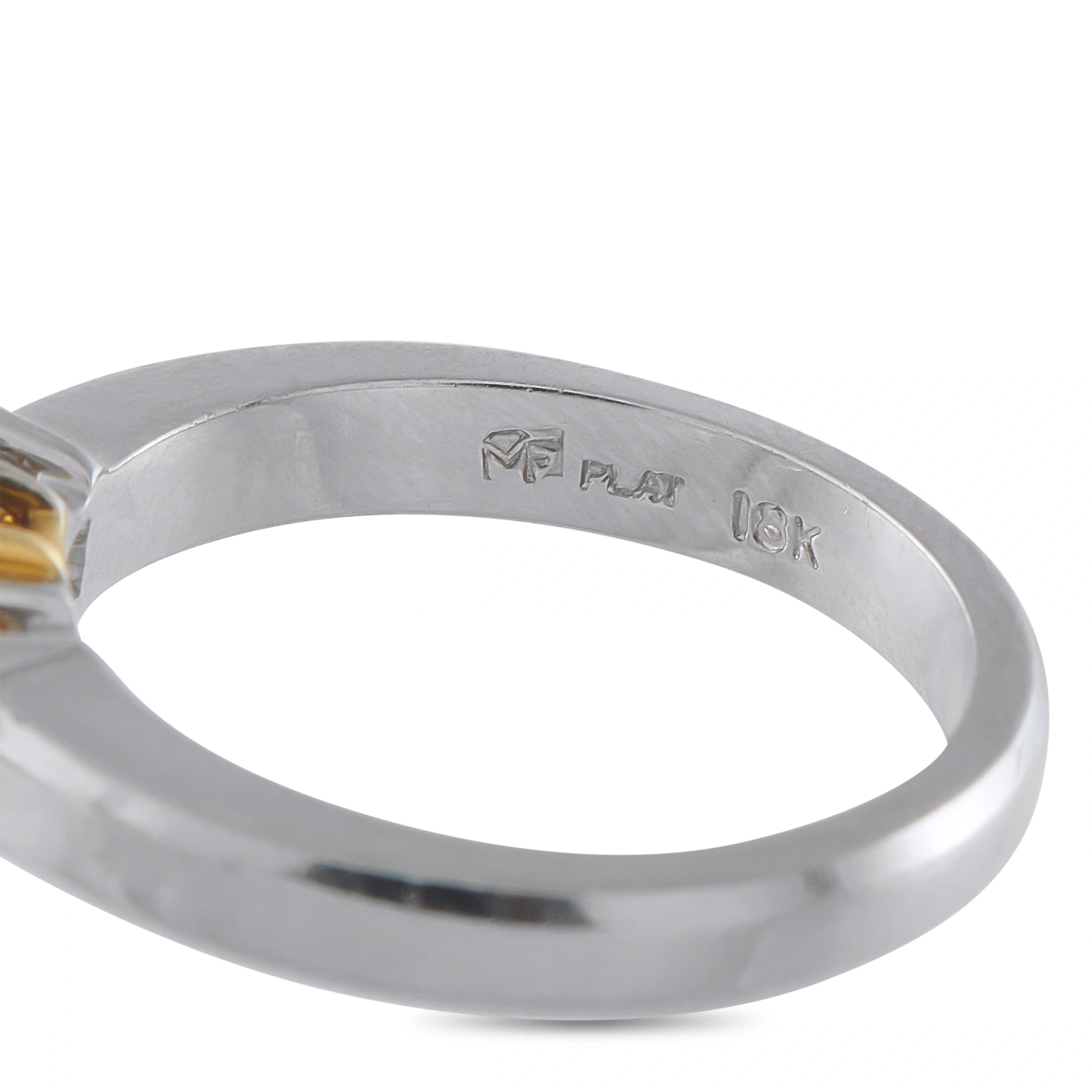 Platinum and 18K Yellow Gold 0.82ct Diamond Three-Stone Ring