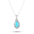 Turquoise oval pendant with diamond accents, silver-toned setting and chain