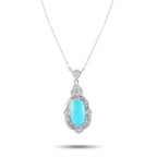 Turquoise oval pendant with diamond accents, silver-toned setting and chain