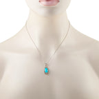 Turquoise oval pendant necklace on fine chain