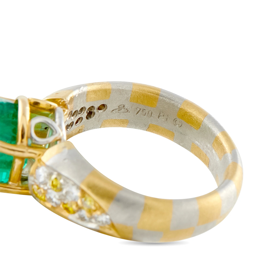 18K gold ring side view with green emerald edge, diamond settings, striped band