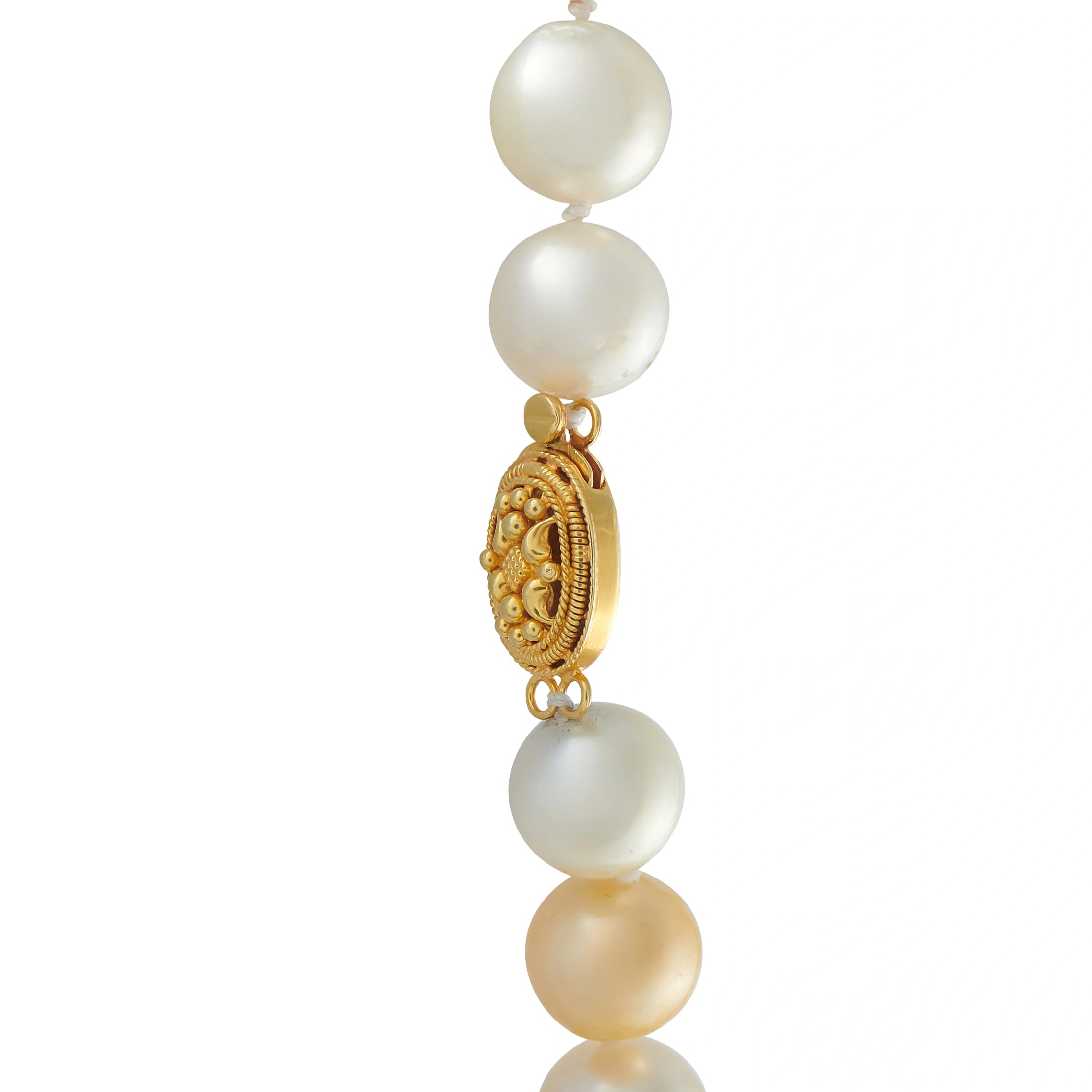 Pearl bead necklace with ornate gold oval centerpiece and linked pearl drops