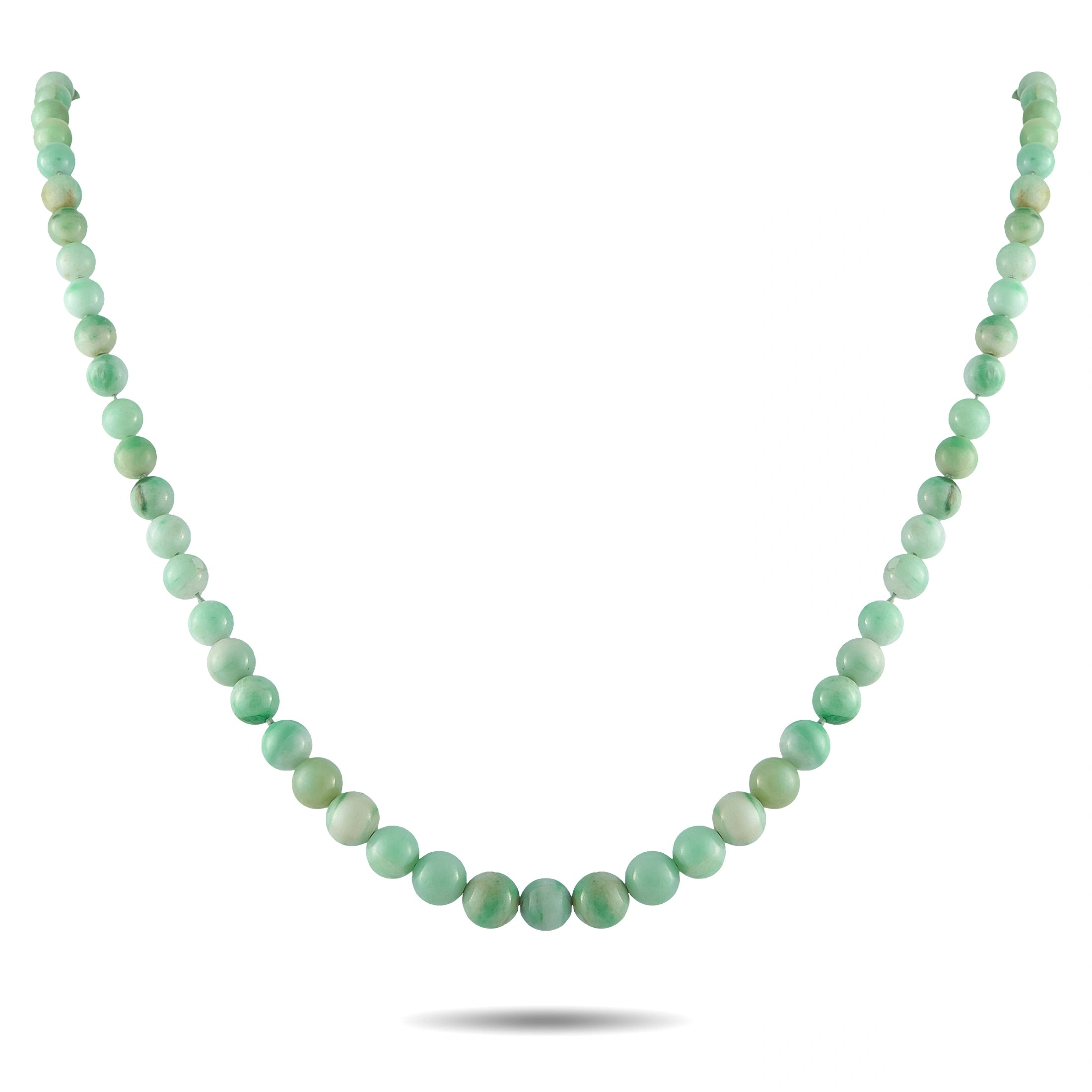 Jade bead necklace with smooth round green beads in a single continuous strand.
