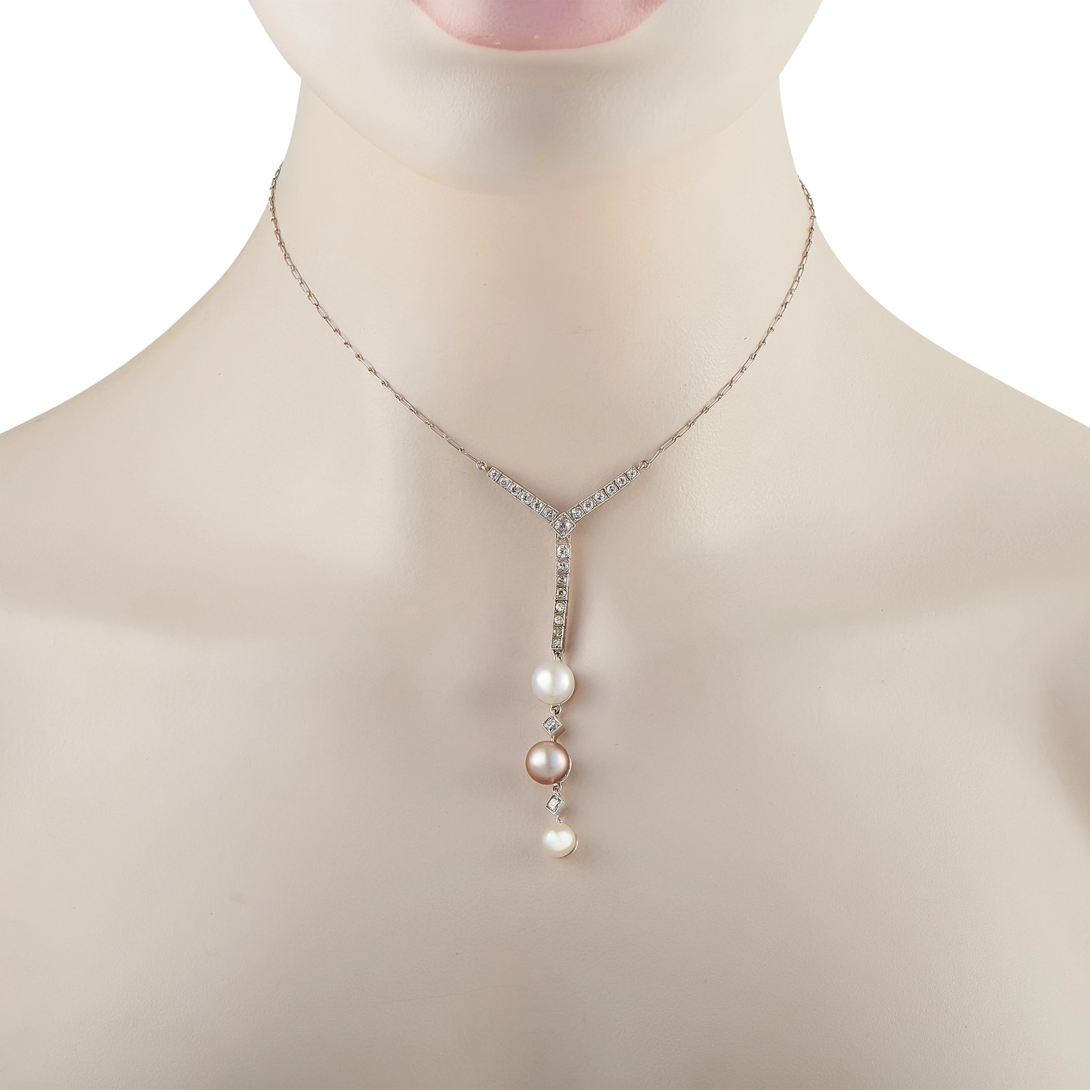 Diamond and pearl pendant necklace with V-shaped diamond bail and three pearls