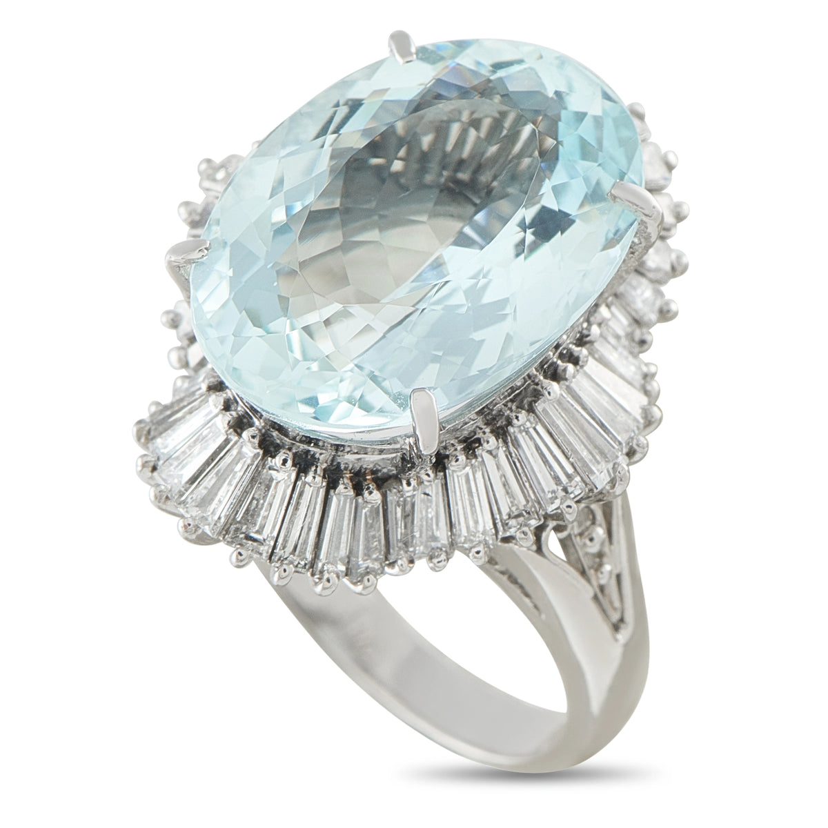 Platinum ring with a large oval aquamarine and a halo of baguette diamonds