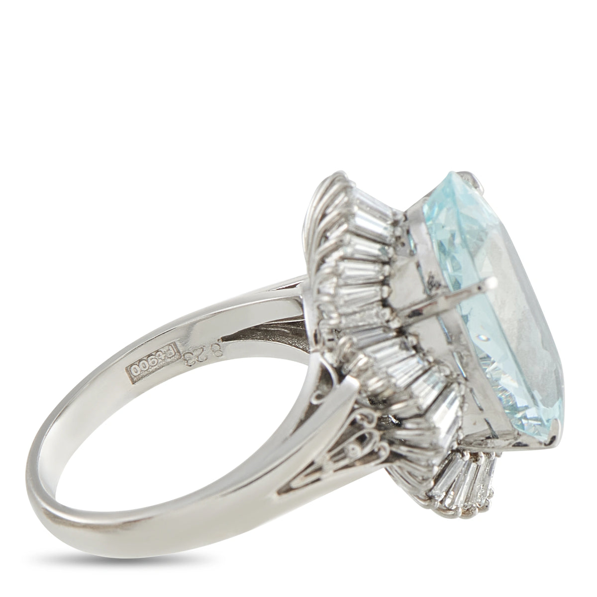 Side view of the platinum ring's raised aquamarine setting and diamond halo