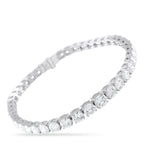 Silver tennis bracelet with round diamond-like stones in a continuous row, hinged clasp