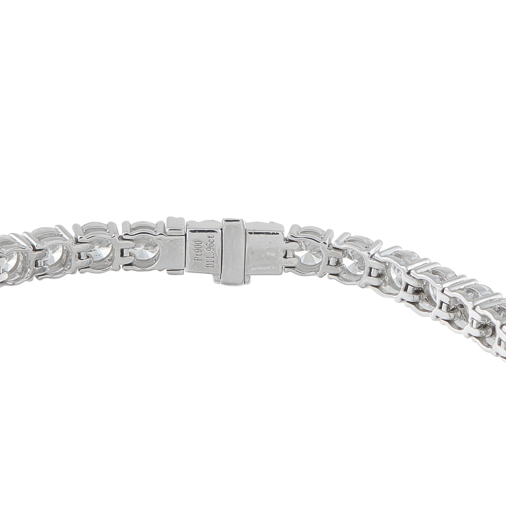 Platinum diamond tennis bracelet with box clasp, close-up view