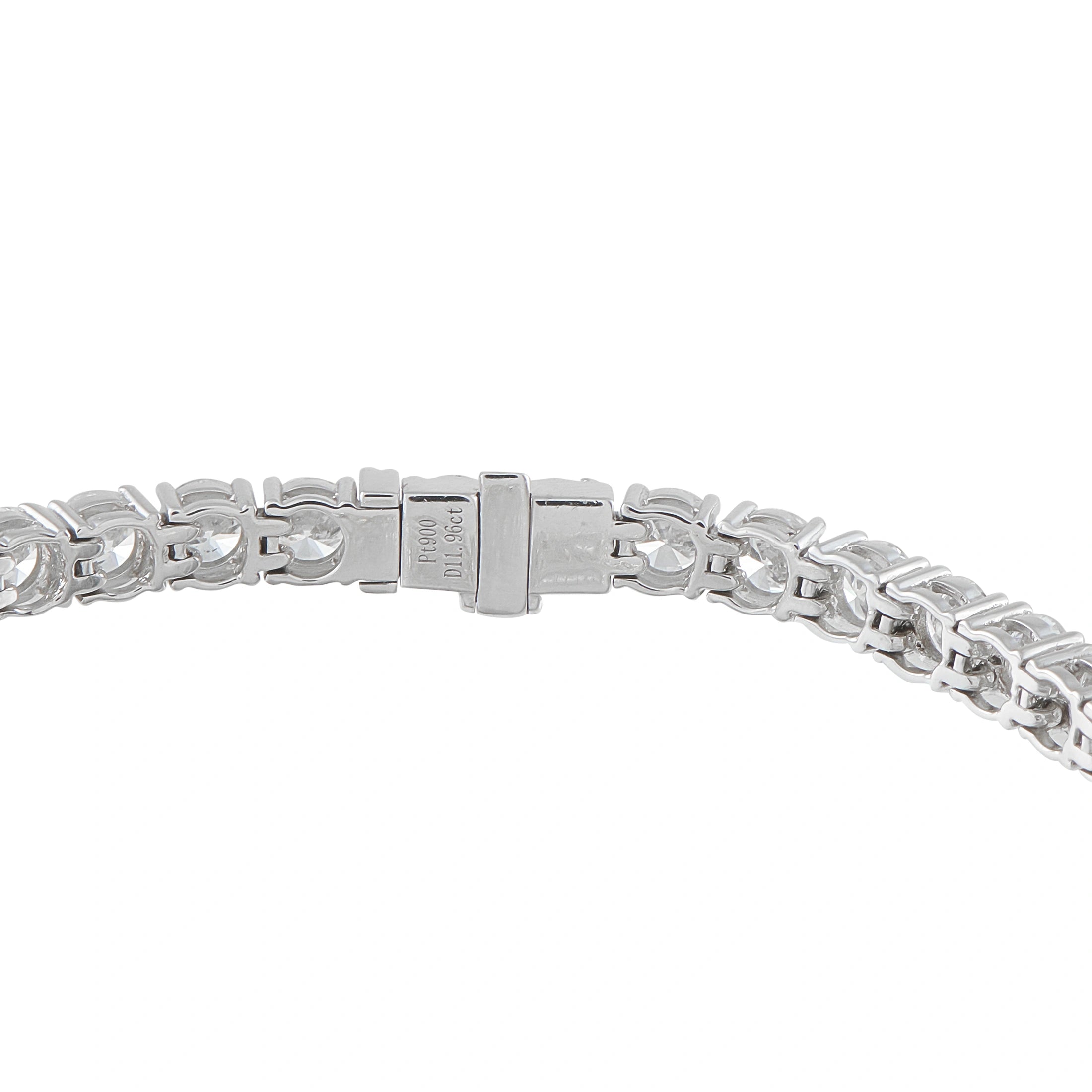 Platinum diamond tennis bracelet with box clasp, close-up view