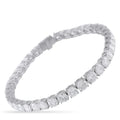 Platinum-toned diamond tennis bracelet with evenly spaced round stones