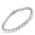 Platinum-toned diamond tennis bracelet with evenly spaced round stones