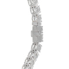 Platinum-toned diamond bracelet clasp with linked stone setting and hallmark