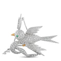 Diamond bird brooch with emerald eye and gold-tone beak, pin and clasp back