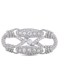 Platinum Art Deco diamond brooch with geometric ribbon design and round/oval stone rows