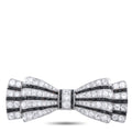 Art Deco diamond bow brooch with pavé stones and dark accents, silver-tone setting